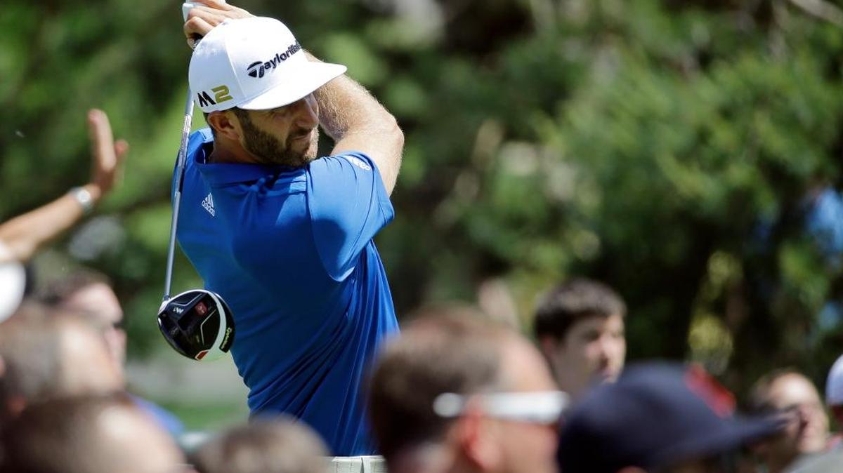 Dustin Johnson tees off on the 15th hole during the second round of the Memorial.
