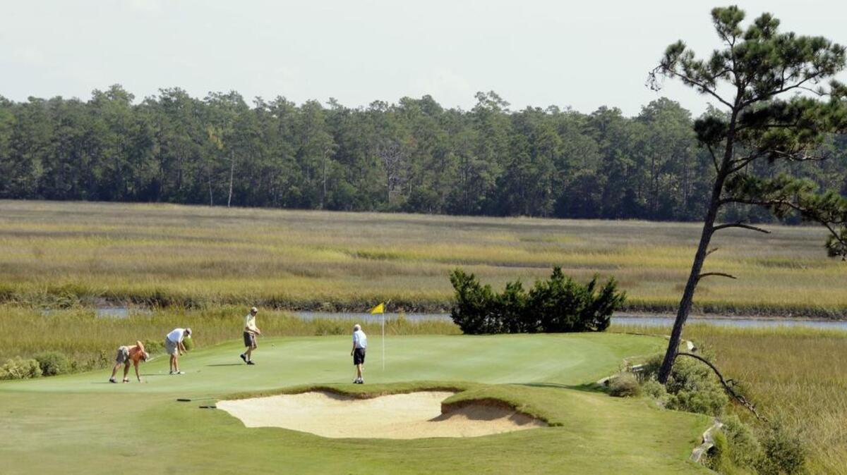 
The 570-yard, par-5 ninth at Rivers Edge Golf Club is the course’s most memorable hole with a bulkheaded peninsula green surrounded by marsh and viewable from the clubhouse.
