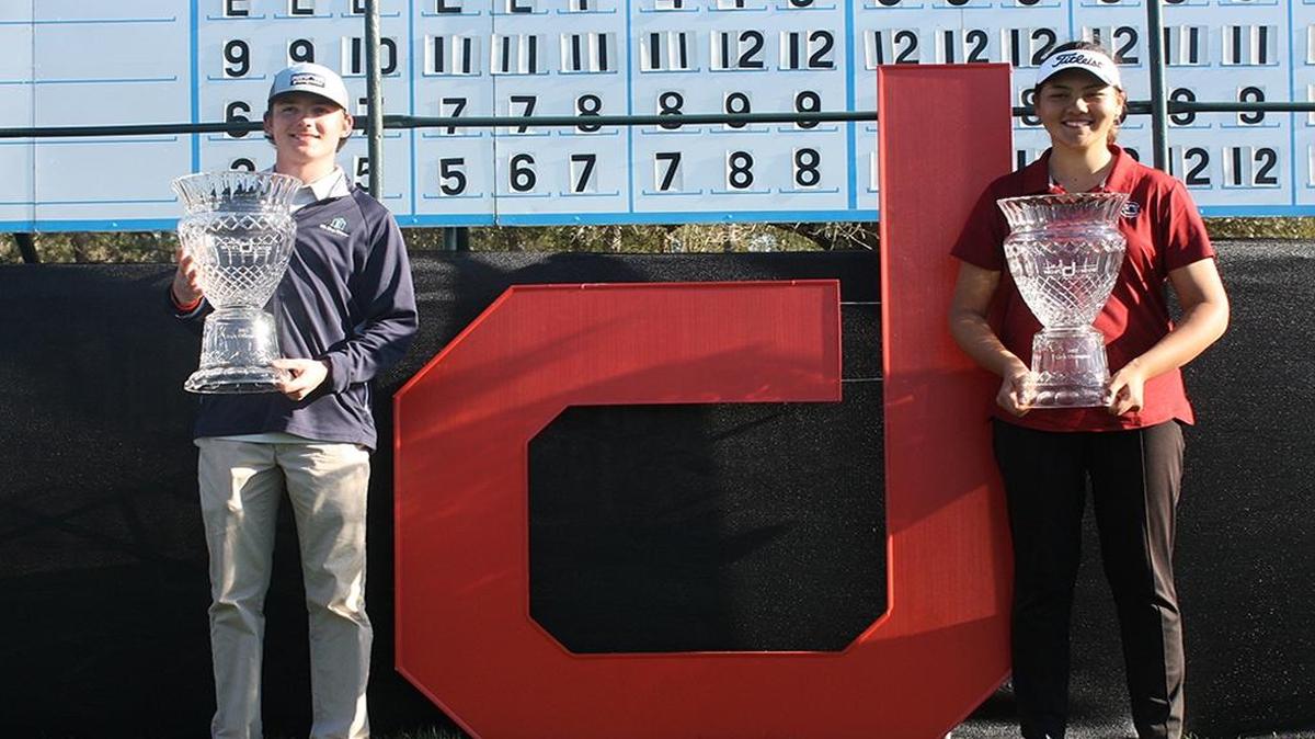 Inman’s Trent Phillips (left) and Buford, Ga.’s Skylar Thompson show off their trophies from the Dustin Johnson World Junior on Sunday.