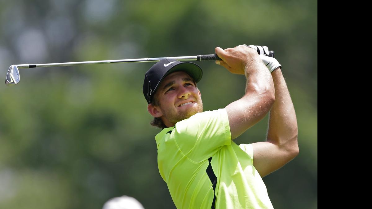 
Patrick Rodgers watches his tee shot on the second hole during the final round of the Wells Fargo Championship.
