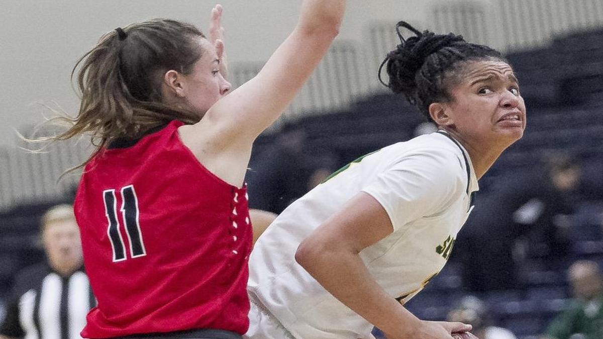 Myrtle Beach’s Kianna Adderton (right) had 31 points against Wilson on Friday night.