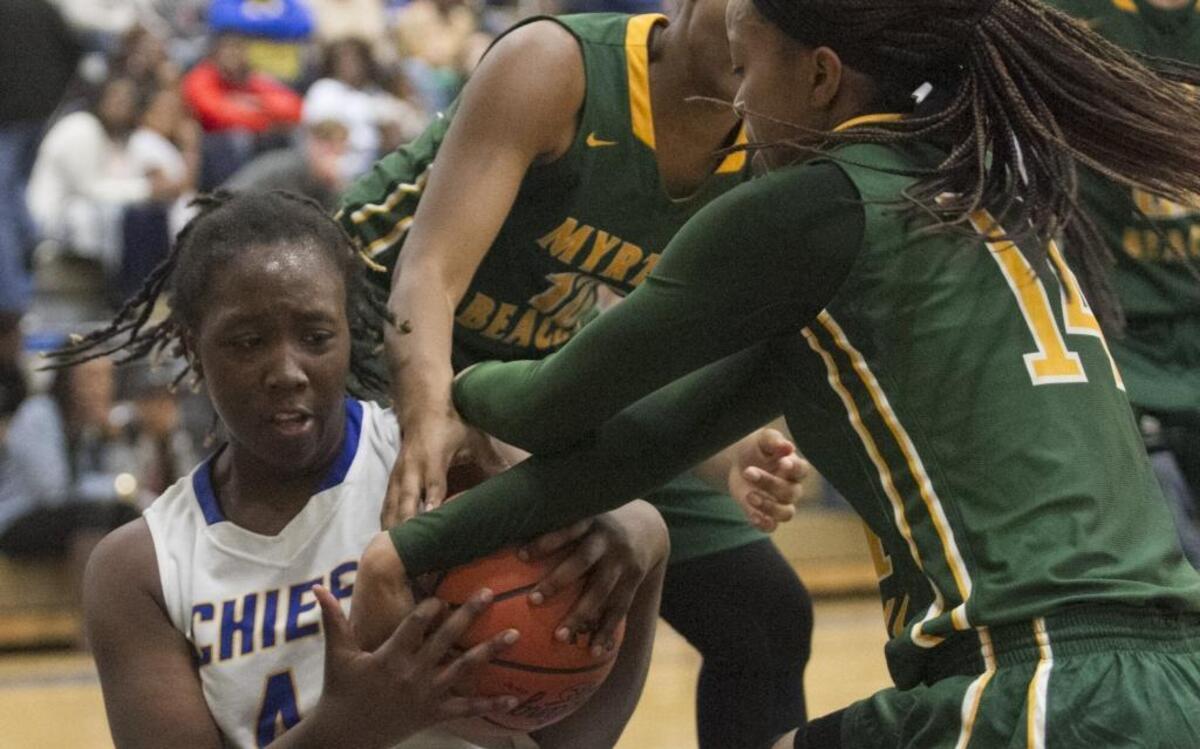 North Myrtle Beach’s Aquera Johnson battles Myrtle Beach’s Nia Sumpter for the ball during the contest between rivals a few weeks ago. Both squads are ranked in the latest SCBCA Class 4A poll.