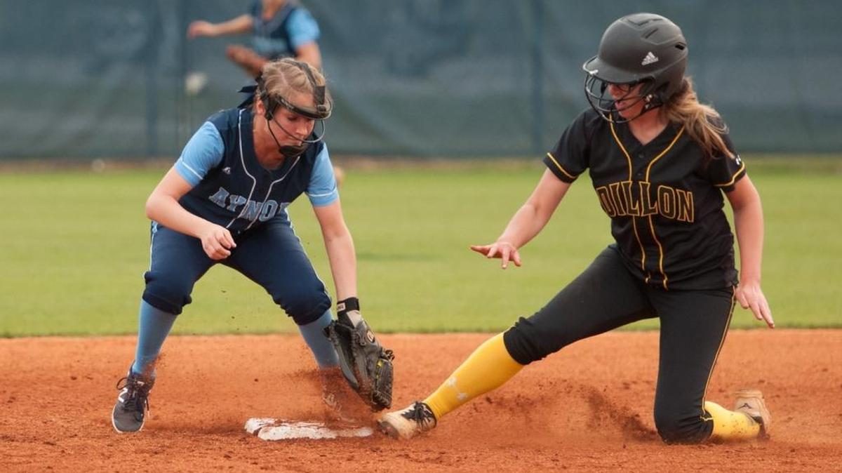 Aynor’s Morgan Richardson (left) reaches for the tag on Dillion’s Ashley Phillips last week.