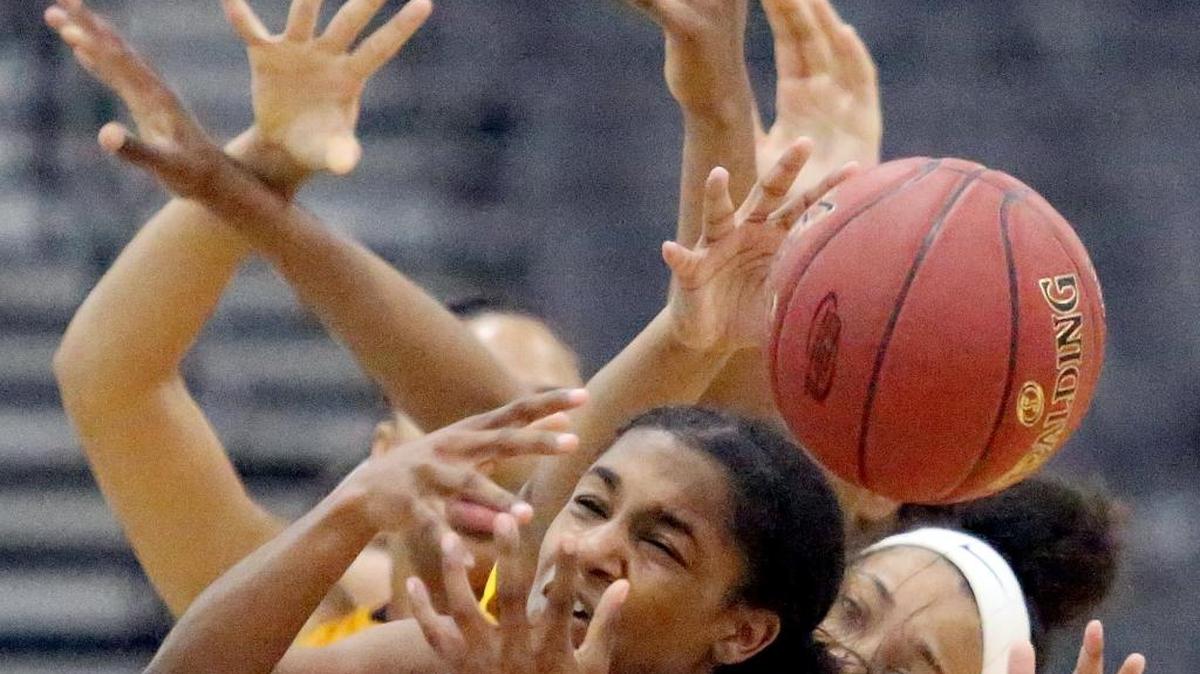 Mia Moore of Saint Francis (Ga.) misses a rebound as Christ the King (N.Y.) defeats Saint Francis (Ga.) 67 to 61 in the finals of the CresCom Bank Holiday Invitational on Saturday. The Beach Ball Classic will begin Tuesday, Dec. 26, 2017, and the finals will be Saturday, Dec. 30, 2017. The dunk contest follows the final game.