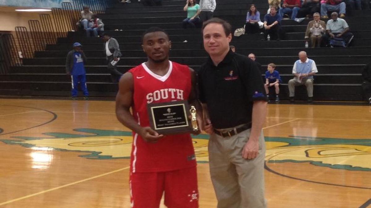 Darlington's Frankie Johnson accepts the S.C. team MVP award following the boys Carolina Classic All-Star Classic.