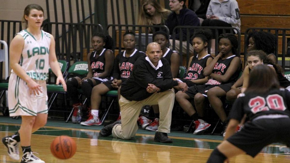 Waccamaw girls basketball coach Marion Busby looks on during his team’s Class AA playoff game at Bishop England.