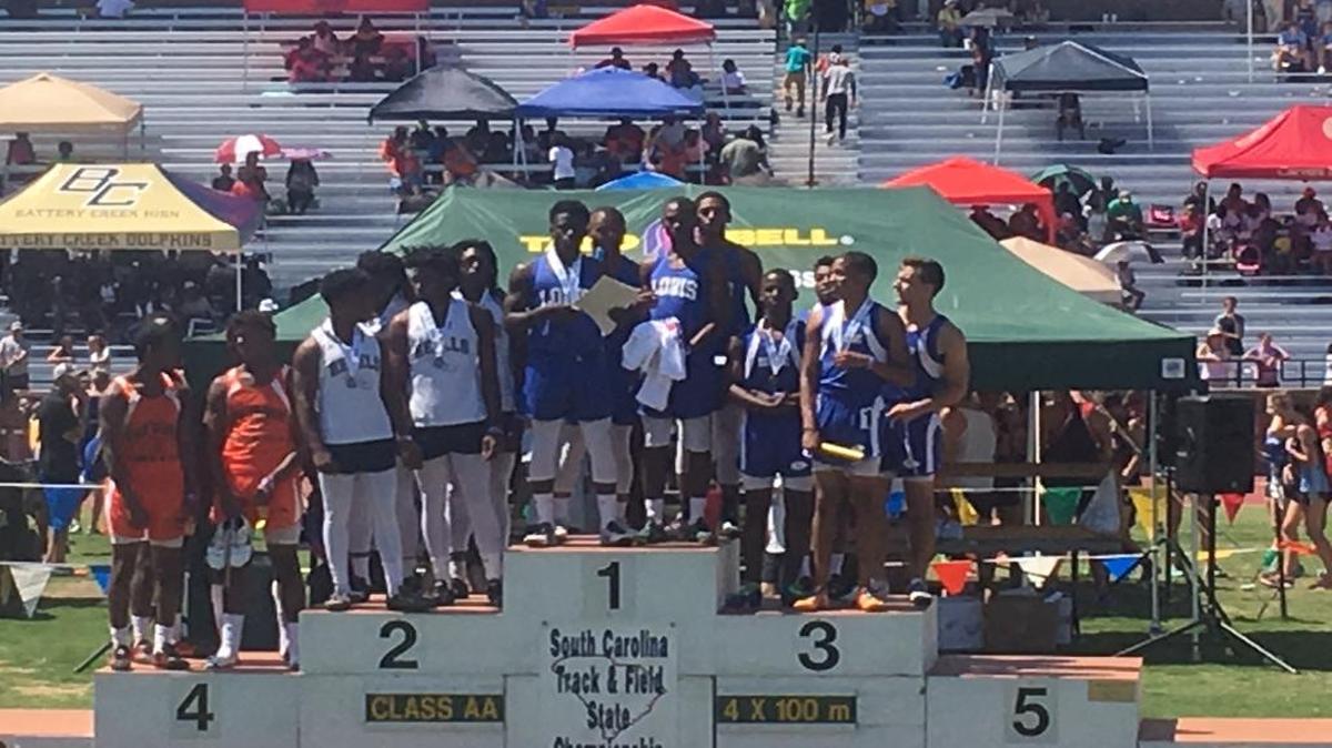 Members of the Loris 400-meter relay team top the podium at the state track and field meet Saturday.