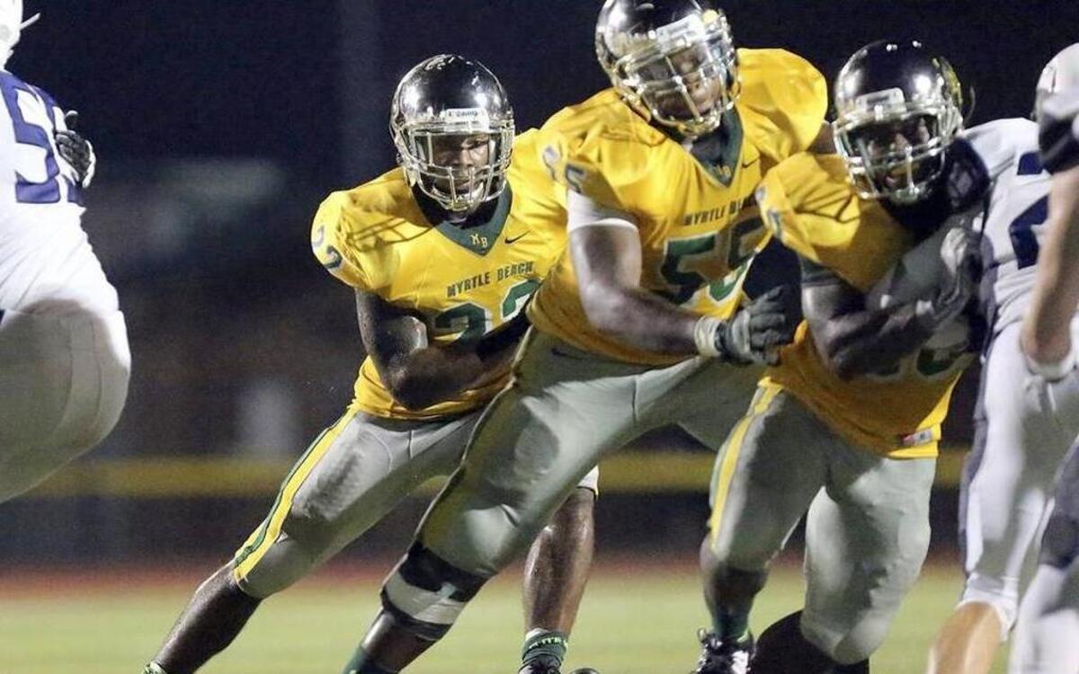 
Myrtle Beach's Brandon Sinclair rushes in the game with Charlotte Christian in the Derrick Law Firm Carolinas Kickoff Clash at Doug Shaw Stadium in Myrtle Beach on Saturday, Aug. 29, 2015. Myrtle Beach lost 24-3 and fell out of the top spot in the high school poll.
