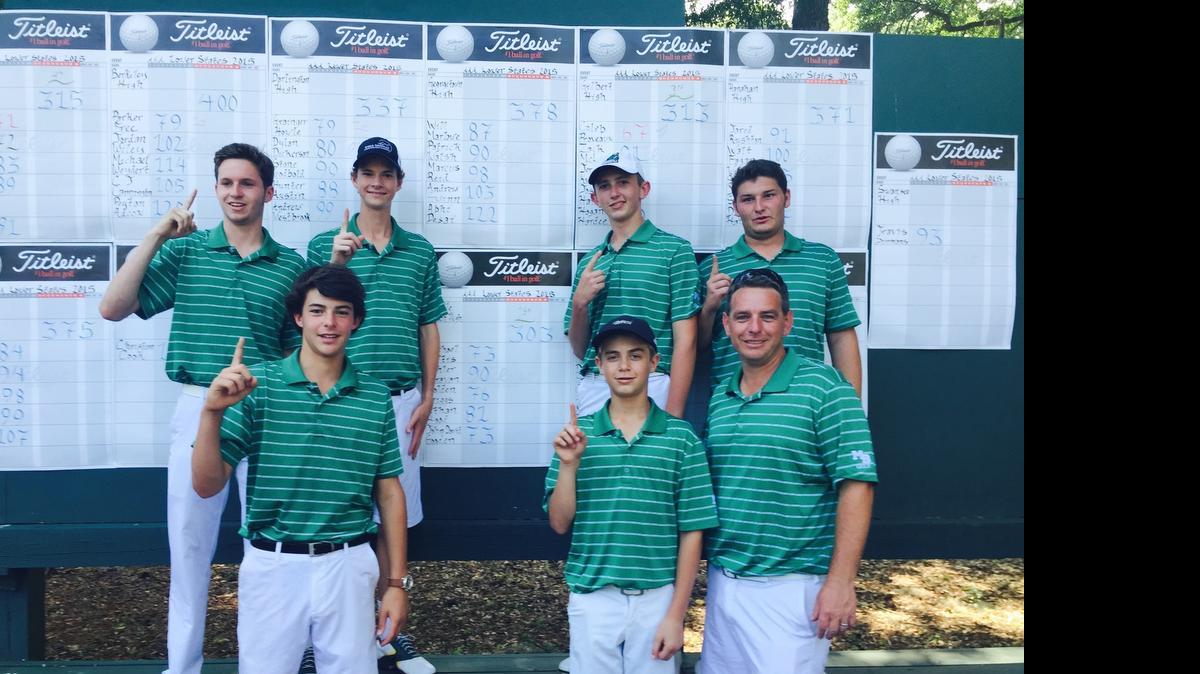 
The Myrtle Beach boys golf team poses in front of the leaderboard after winning the Lower State tournament in Hilton Head Island on Monday.
