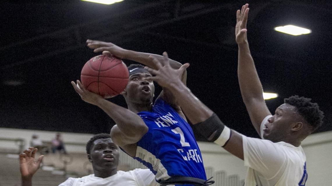 Dillard (Fla.) dominates the paint in a win over Canada’s Henry Carr