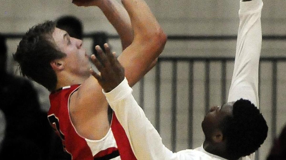 Former Franklin (Ohio) and Duke standout Luke Kennard gets a shot over a Mullins defender en route to a 52-point performance during the 2014 Beach Ball Classic.
