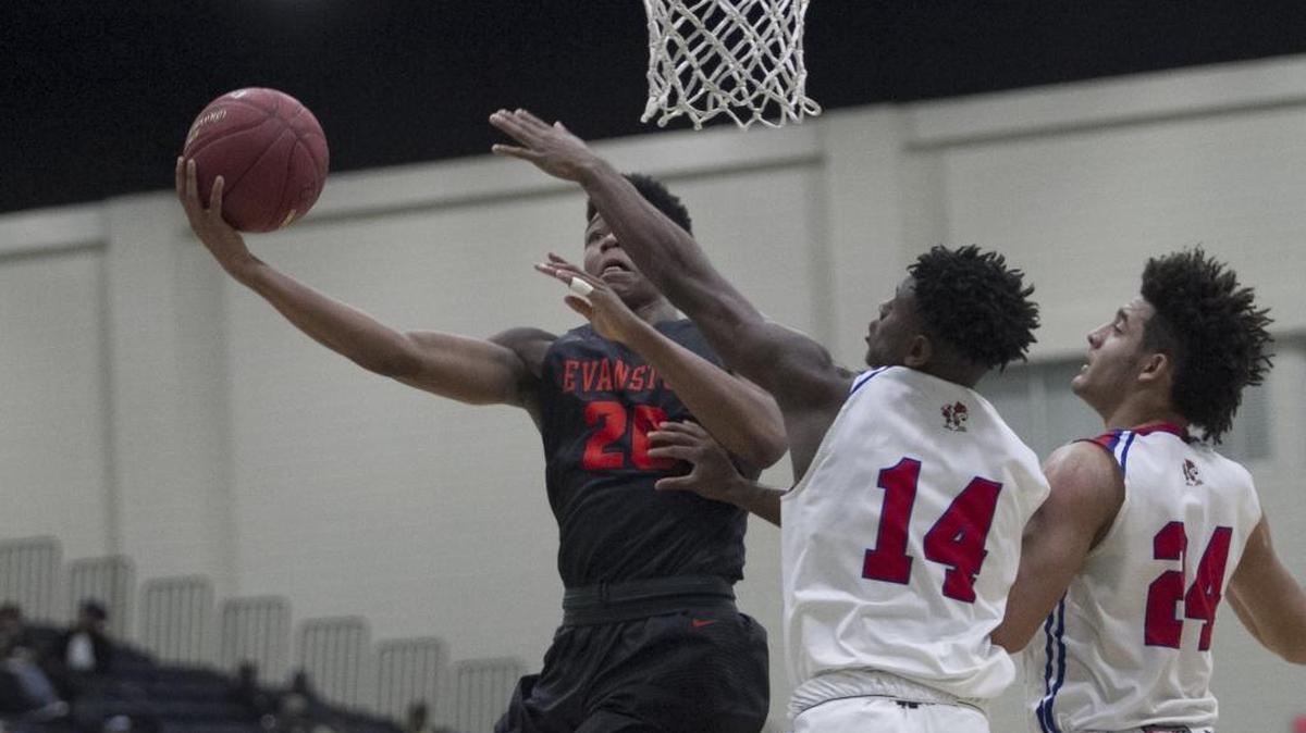 Evanston Township’s Harry Porter scores during the Wildkits’ Beach Ball Classic matchup with Scott County (Ky.).