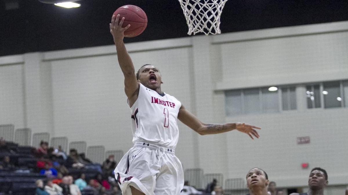 Imhotep’s Daron Russell goes up for a layup during Saturday’s game against Evanston Township in the Beach Ball Classic championship game.