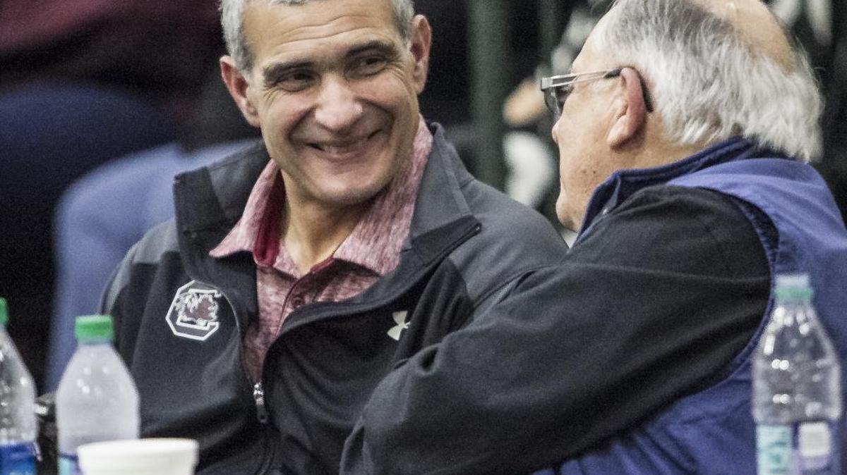 University of South Carolina head basketball coach Frank Martin talks to Myrtle Beach Mayor and Beach Ball Classic director John Rhodes at the Myrtle Beach Convention Center on Wednesday.