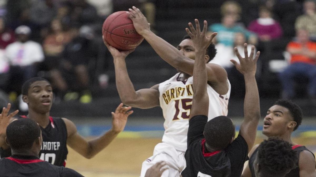 Christ the King's Kendale Greenidge-Bullock shoots over Imhotep defenders during Beach Ball Classic action earlier this week.
