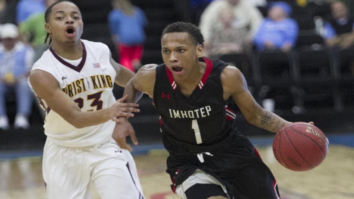 Imhotep Charter (Pa.) guard Daron Russell drives past a Christ the King (N.Y.) defender during Tuesday’s Beach Ball Classic game.