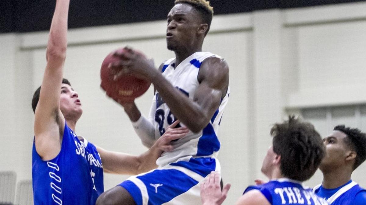 Harrison Hillard takes it to the hoop for Shadow Mountain in Thursday’s Beach Ball Classic third place game.