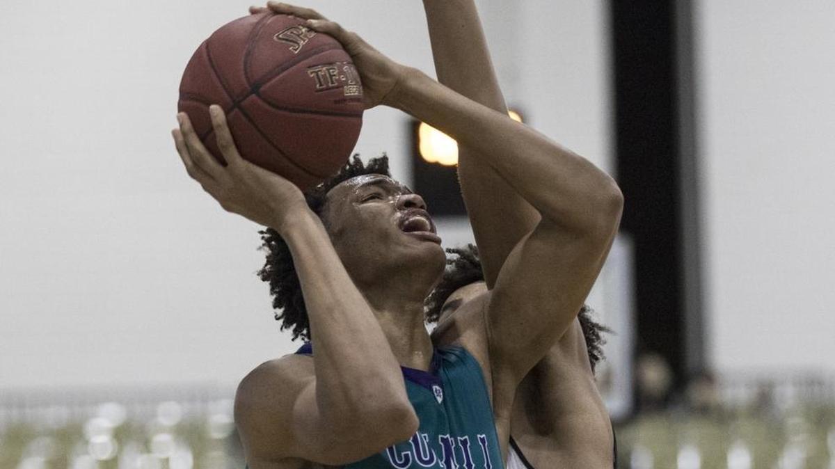 Cox Mill’s Wendell Moore Jr. shoots against Clark (Nev.) during last year’s Beach Ball. Moore scored 32 points and he returns with his teammates from North Carolina for the 2018 Beach Ball Classic at the Myrtle Beach Convention Center this week.