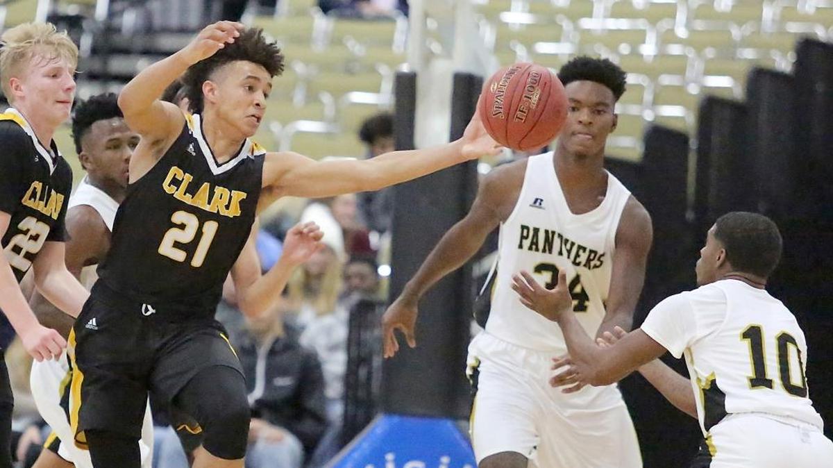 Jalen Hill (21) of Clark (Nev.) causes a turnover in his team’s game with Lanett (Ala.) during the Beach Ball Classic on Tuesday.