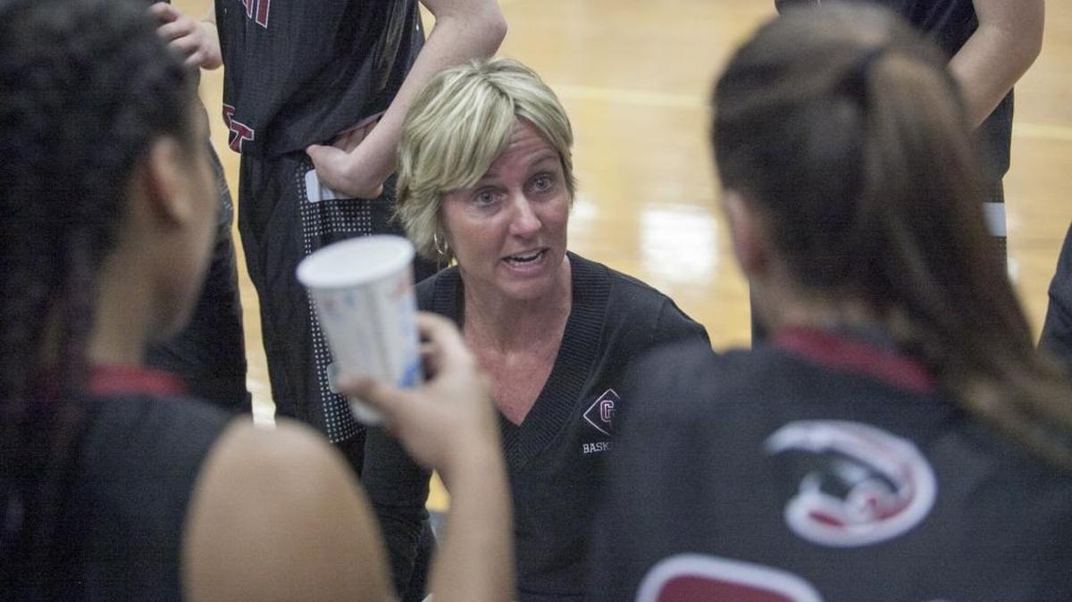 Carolina Forest girls basketball coach Stacy Hughes talks to her players during Thursday’s win over Socastee.