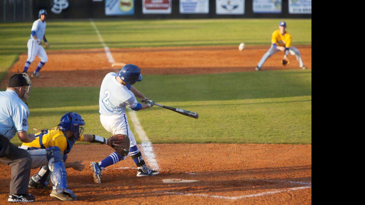 
St. James’ Martin Drake with a sacrifice fly ball against the North Myrtle Beach Chiefs.
