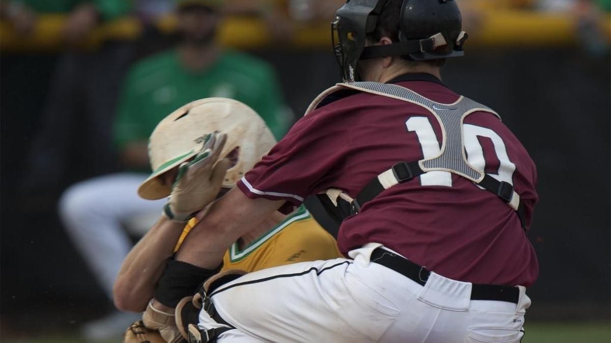 Carolina Forest catcher Ryan Gold (10) tags out Summerville base runner Jonny Watts during the teams’ playoff matchup last month. Gold was slected by the Toronto Blue Jays on Saturday in the 2016 MLB Draft.