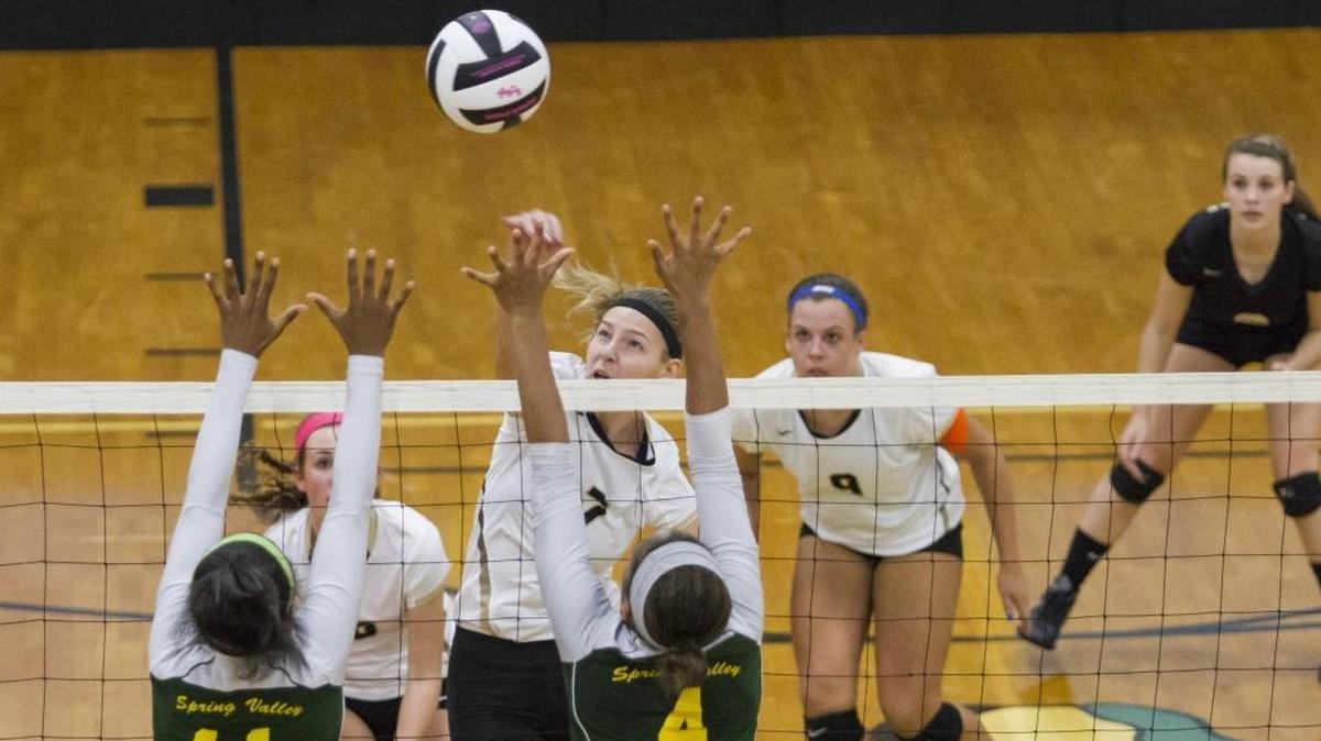 Socastee's Krysta Tesone gets the ball past Spring Valley defenders in Thursday’s Class AAAA first round matchup. The Braves swept the match to advance to the second round of the playoffs.