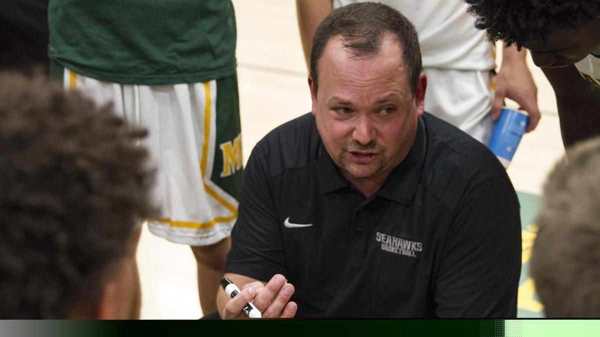 Myrtle Beach coach Craig Martin plans plays with his boys. High school basketball kicked off tonight with the Myrtle Beach boys and girls topping Socastee High school. The Myrtle Beach boys fought to a 73-64 victory over Socastee and the girls won with a decisive 62-31 final. Nov. 28, 2017