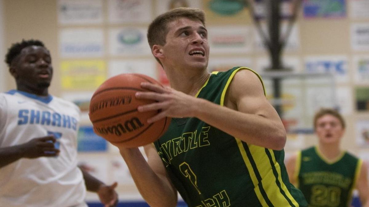 Myrtle Beach guard Robert Swanson eyes his shot during Thursday’s game at St. James.