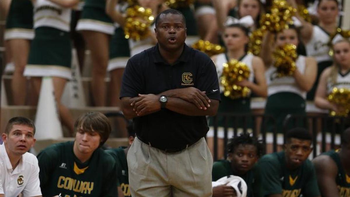 Conway coach Michael Hopkins yells out directions to his team during a recent game.