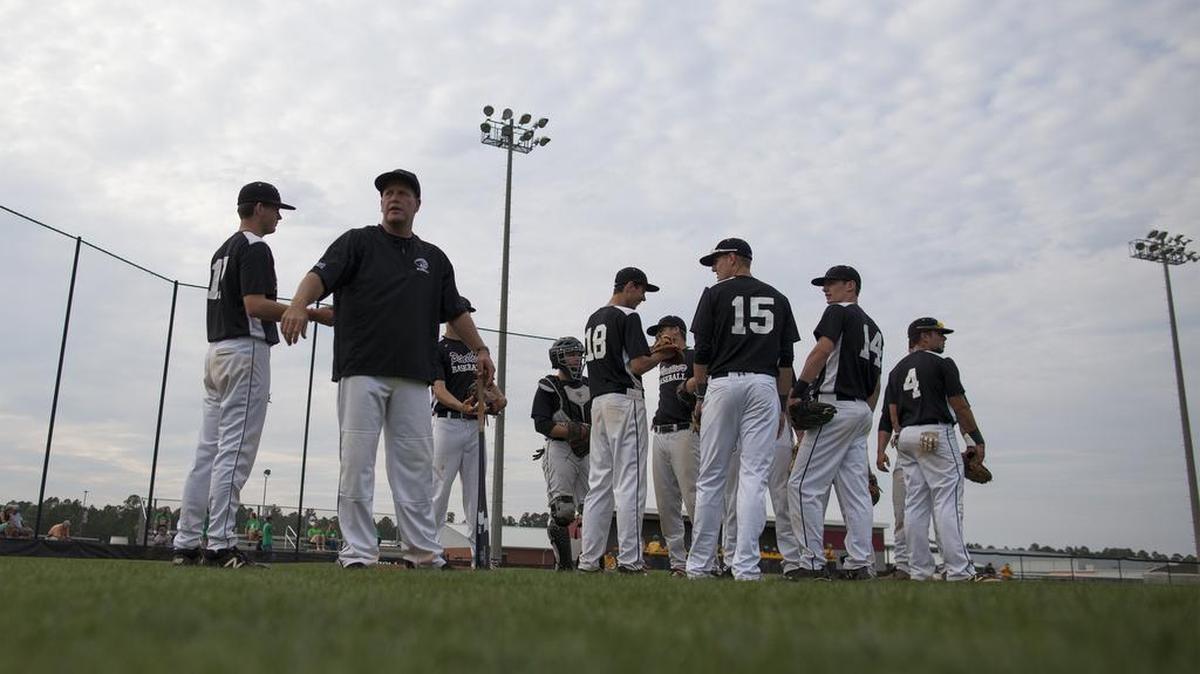 Carolina Forest Jack Jolly calls his team for a huddle before their game with Summerville on Monday.