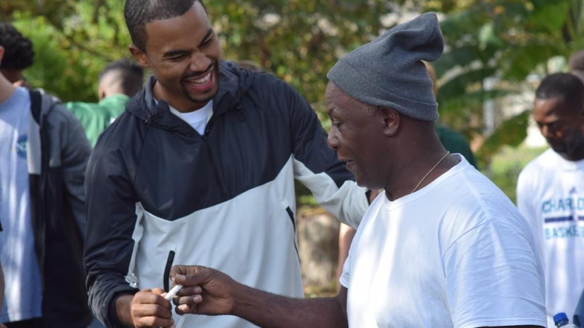 NBA player Ramon Sessions, left, announced the “Sessions Challenge,” a campaign to raise funds to renovate the Myrtle Beach High School basketball locker rooms, during his annual turkey drive in November.