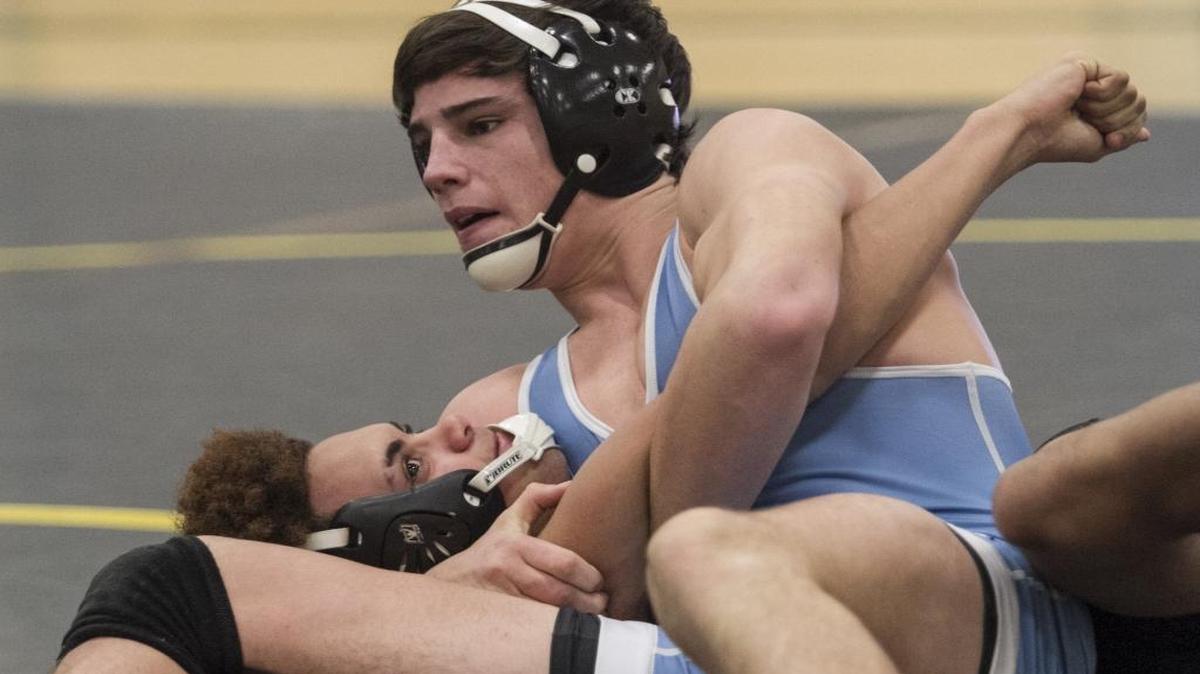 St. James’ Brandon Ellis gets the upper hand on Myrtle Beach’s Tahle Rhodes during a match earlier this season.