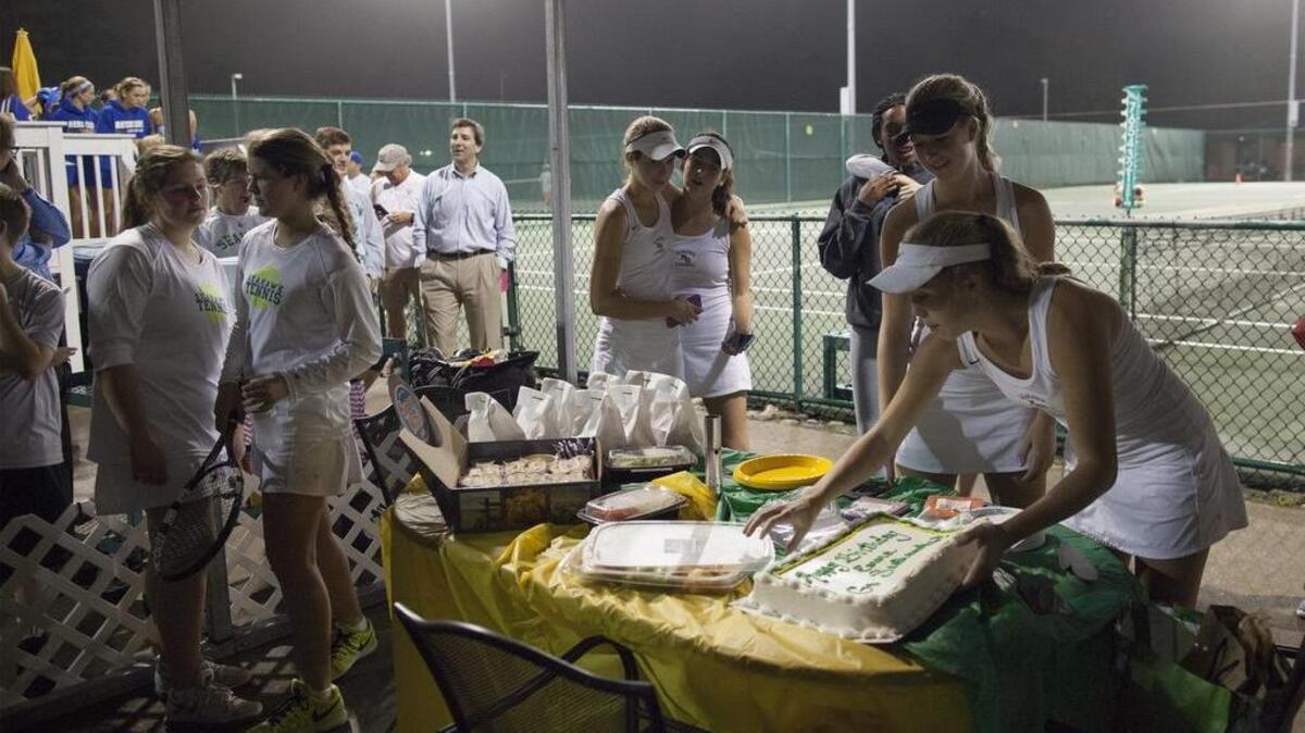 Myrtle Beach players celebrate with cake after beating Berkeley in the second round the of Class AAA playoffs on Wednesday. On Friday, the Seahawks beat Hartsville to advance to the Lower State finals.