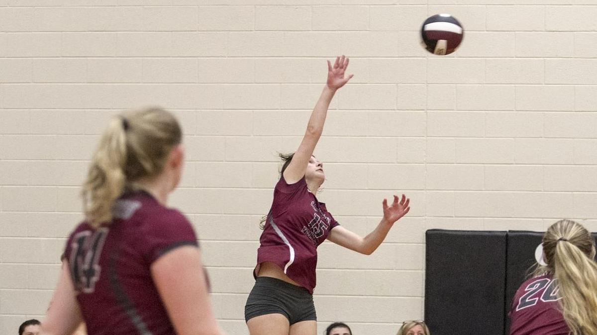 Carolina Forest’s Hanna Walton hits the ball over the net Tuesday.