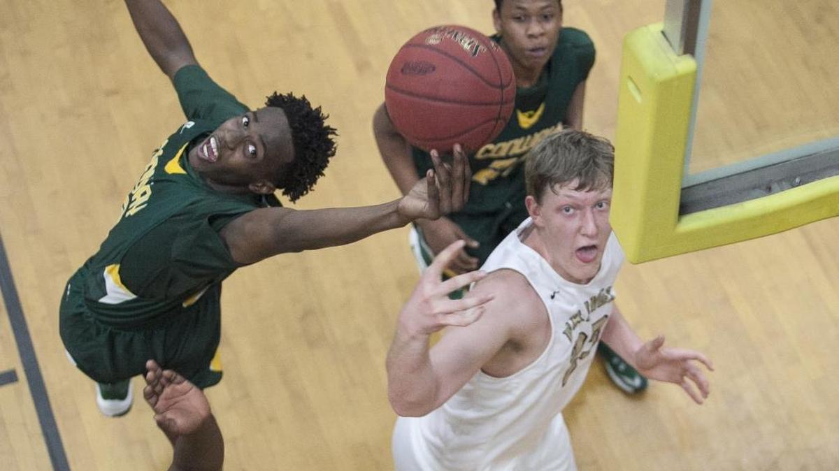 Conway's Jimmy Nichols snatches a rebound from Socastee’s Jason Cudd during one of their two meeting this past season.