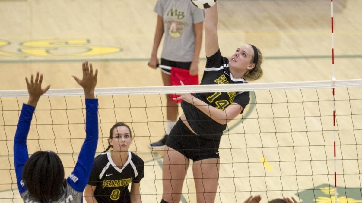 Myrtle Beach outside hitter Gracie Davis sends a ball back over the net during a game last season.