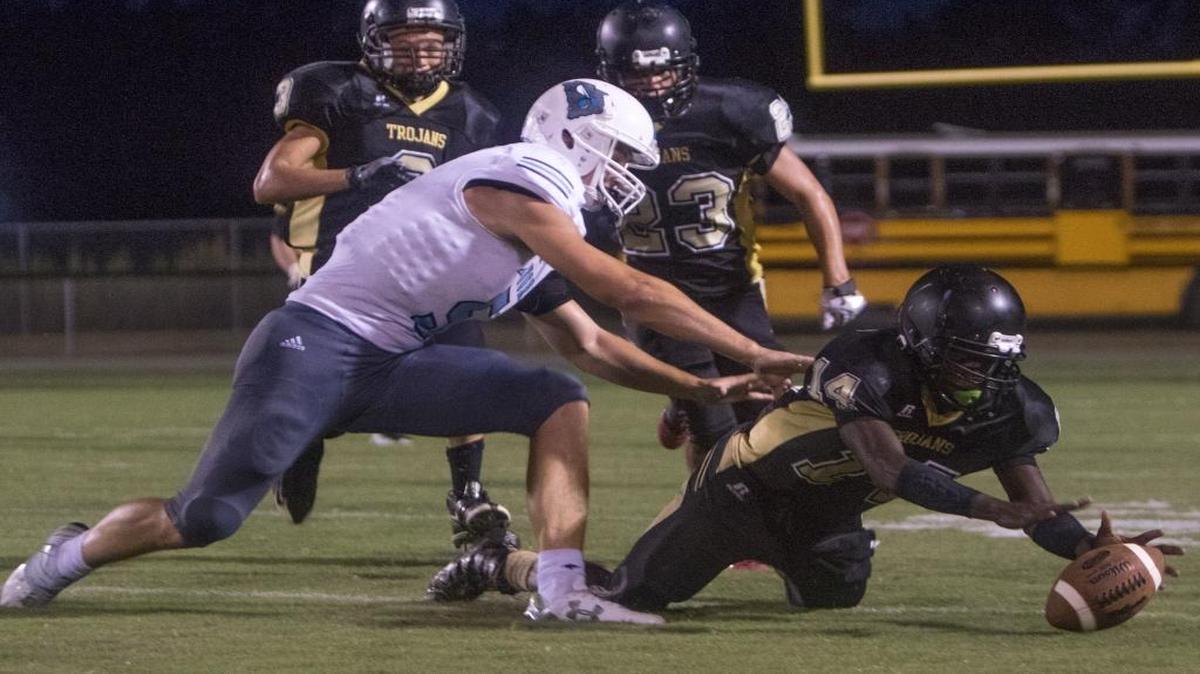 Green Sea Floyds’ Shaquan Gillard pounces on a loose ball during a game last season.