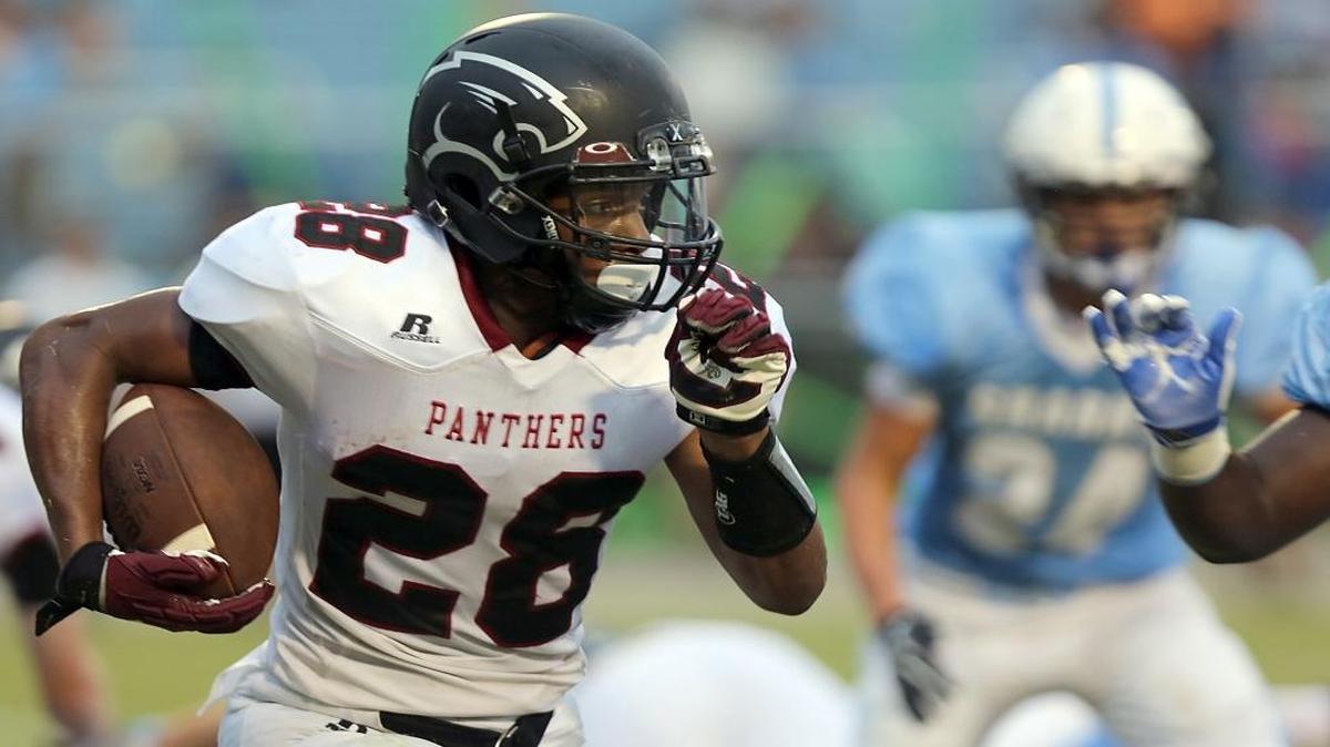 Carolina Forest running back Dyverse Simmons looks for space during last Friday’s game at St. James.