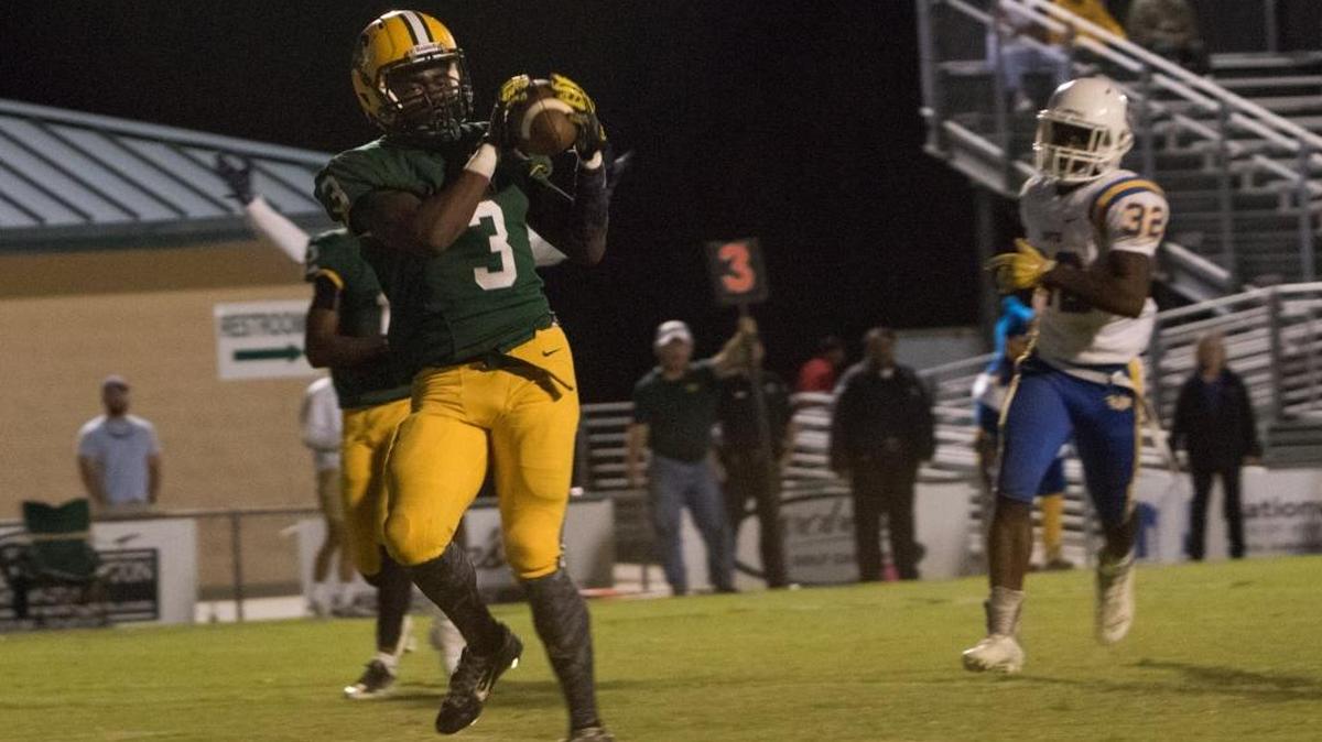 Malachi Miller completes a pass from Derrick to complete the Tiger's first touchdown of the game just before the half as Conway hosts Sumter Friday, October 21, 2016.