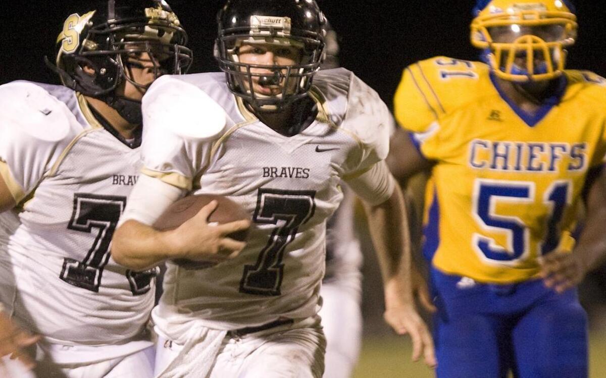 
Socastee’s Hunter Renfrow runs the ball during a 2013 game against North Myrtle Beach.
