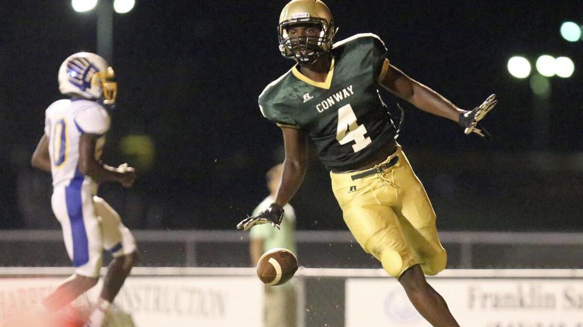 
Conway’s Bryan Edwards (4) scores a touchdown during the CNB Kickoff Classic.
