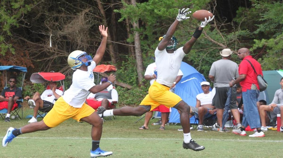 A Myrtle Beach receiver stretches to make a catch during early action Saturday at the Palmetto State Showdown 7-on-7 tournament in Duncan.