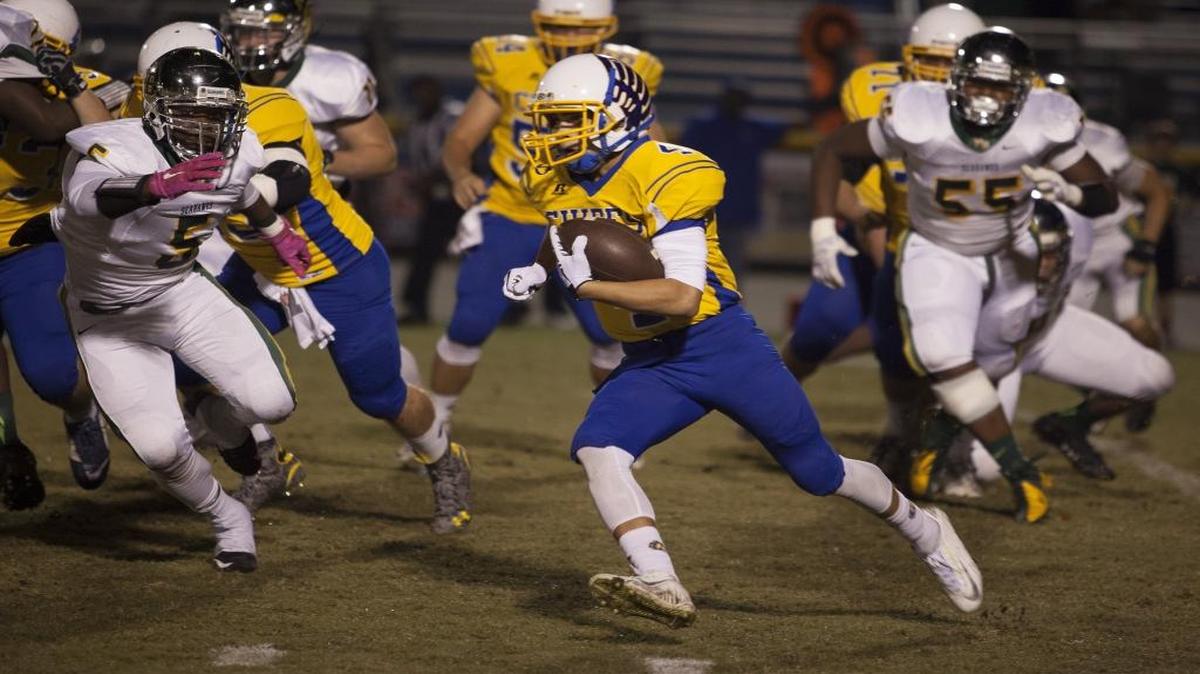 North Myrtle Beach running back Kered Class (4) looks for open yardage during last year’s game with Myrtle Beach. The teams meet once again on Friday, in a matchup of teams that are ranked and undefeated.