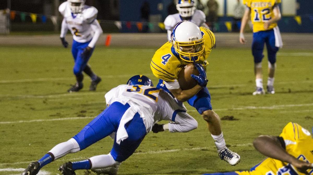 
North Myrtle Beach's Kered Class breaks multiple tackles to score against Lake City in the first half. North The Chiefs beat the Panthers 33-19.
