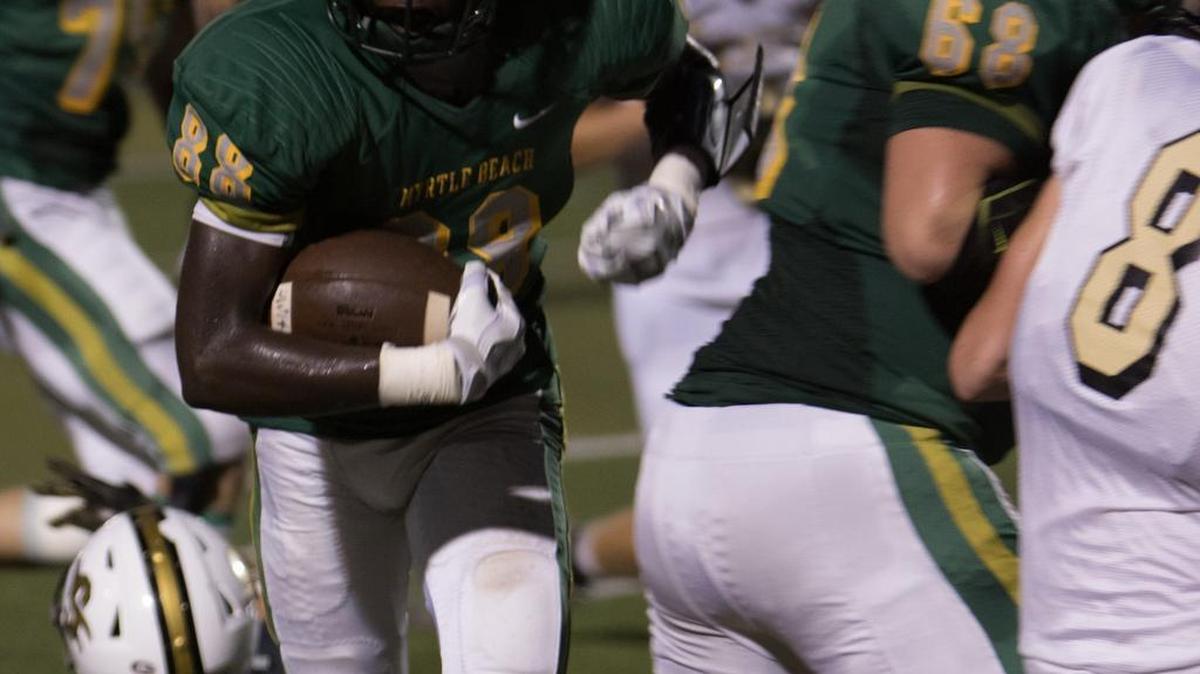 Myrtle Beach wide receiver Daron Finkley dashes toward the end zone during the Seahawks’ 70-0 win over Socastee this past Friday.