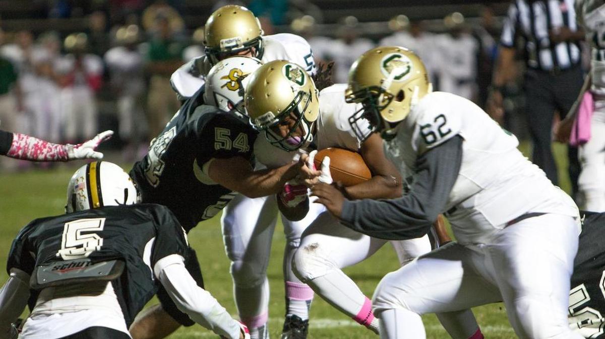 
Jah-Maine Martin pushes into Braves defense as Socastee hosts Conway Friday, October 16, 2015
