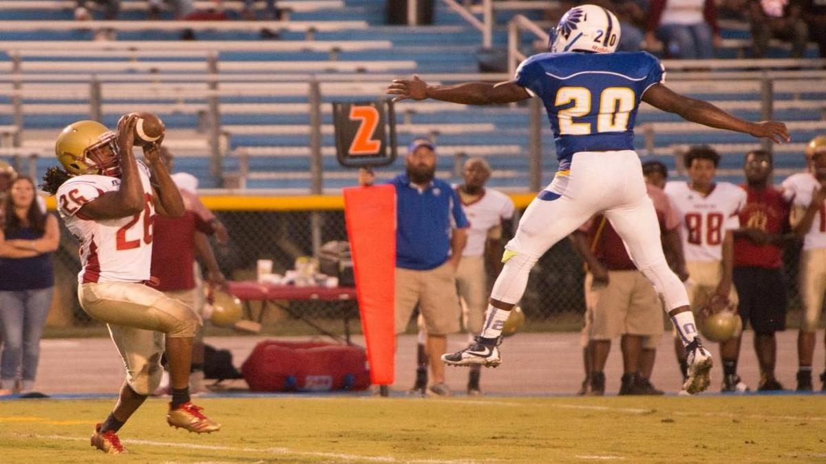 Andre Marks brings a pass during the Carvers Bay at North Myrtle Beach football game Friday night.