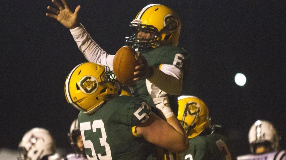 Conway's Darren Grainger celebrates a touchdown over Wando with team mate Gunner Britton. Conway defeated Wando in the first round of the playoffs, 34-10. November 3, 2017.