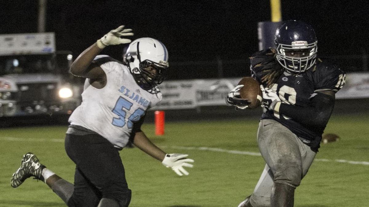 Georgetown standout lineman Zaire Barron reaches the end zone in a game earlier this season.